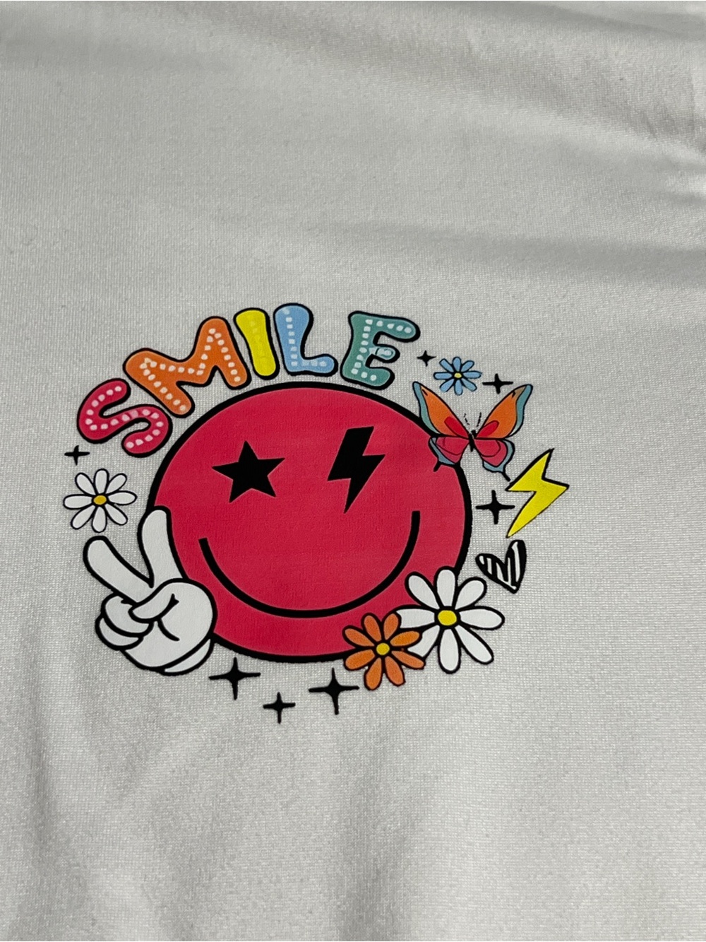 Women’s White Tee with Pink Smiley "SMILE" Graphic